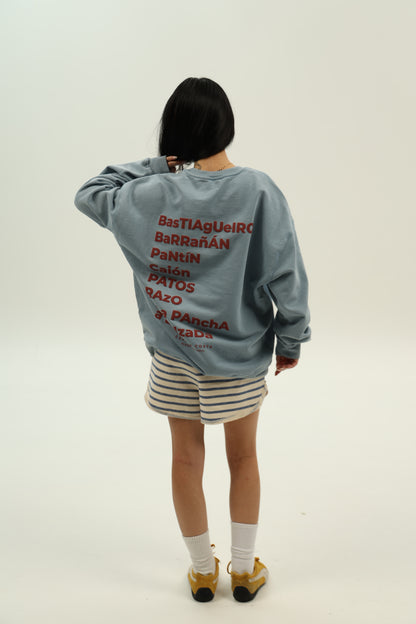 SUDADERA AZUL-LAVADO/MORADO "PLAYAS SURF"