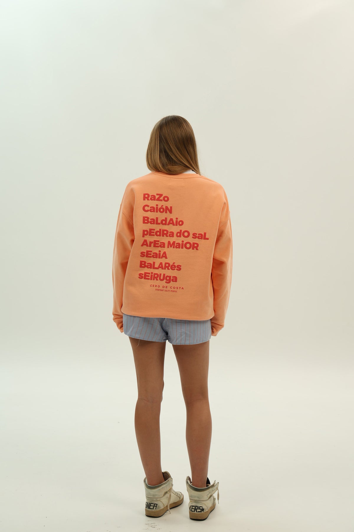 SUDADERA MELOCOTÓN/ROJO "PLAYAS RAZO"