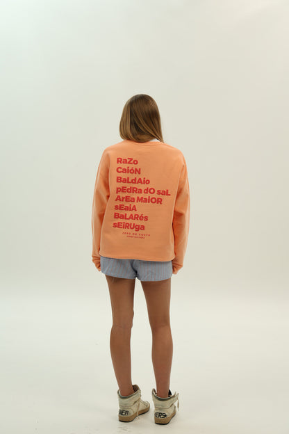 SUDADERA MELOCOTÓN/ROJO "PLAYAS RAZO"