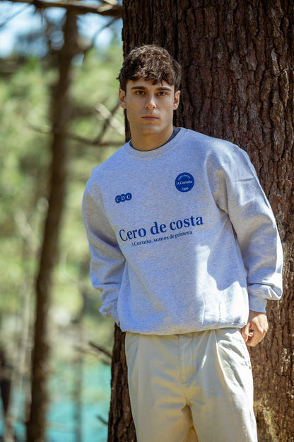 SUDADERA GRIS/AZUL "SOMOS DE PRIMERA"