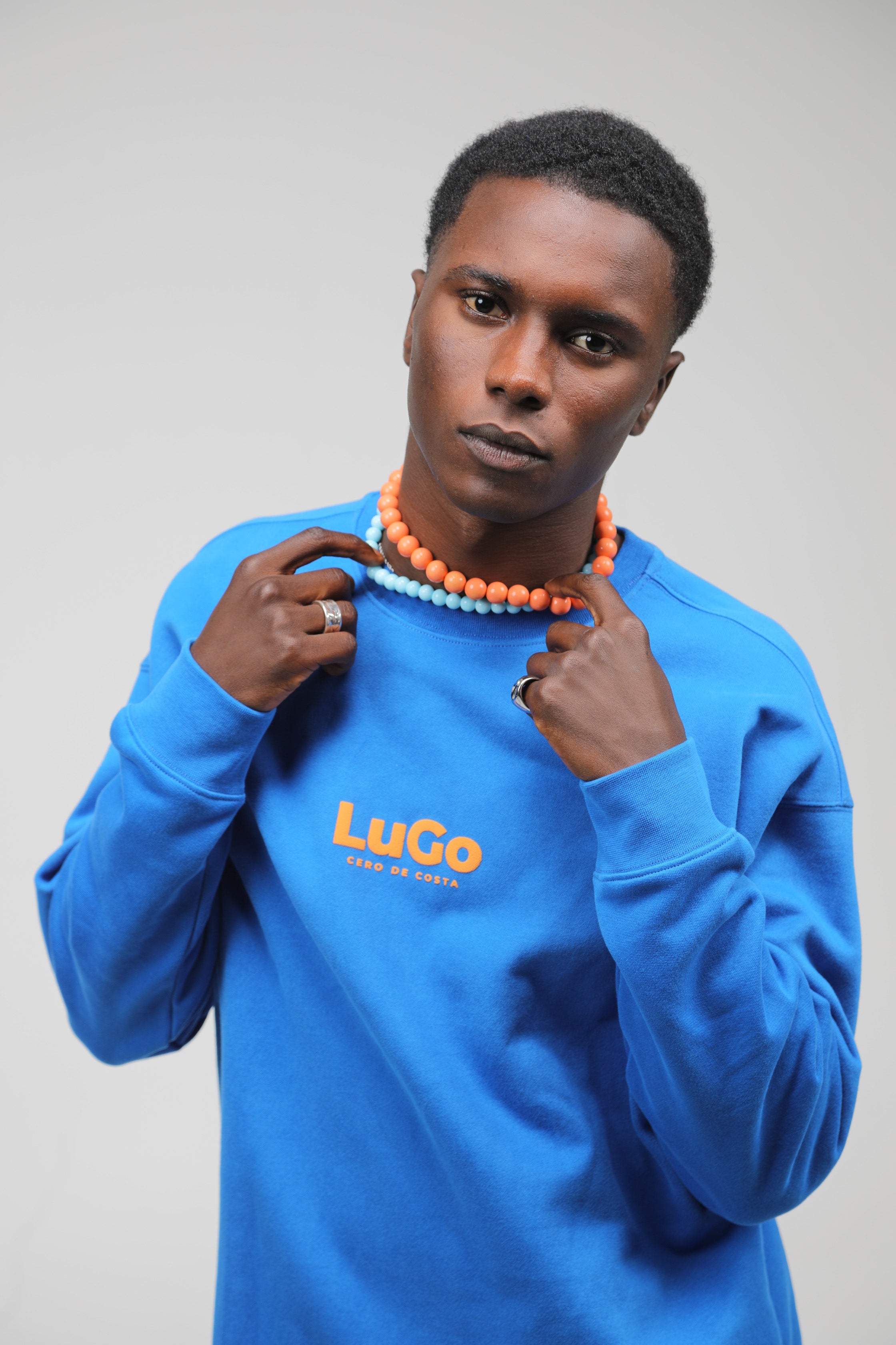 SUDADERA LUGO AZUL/NARANJA