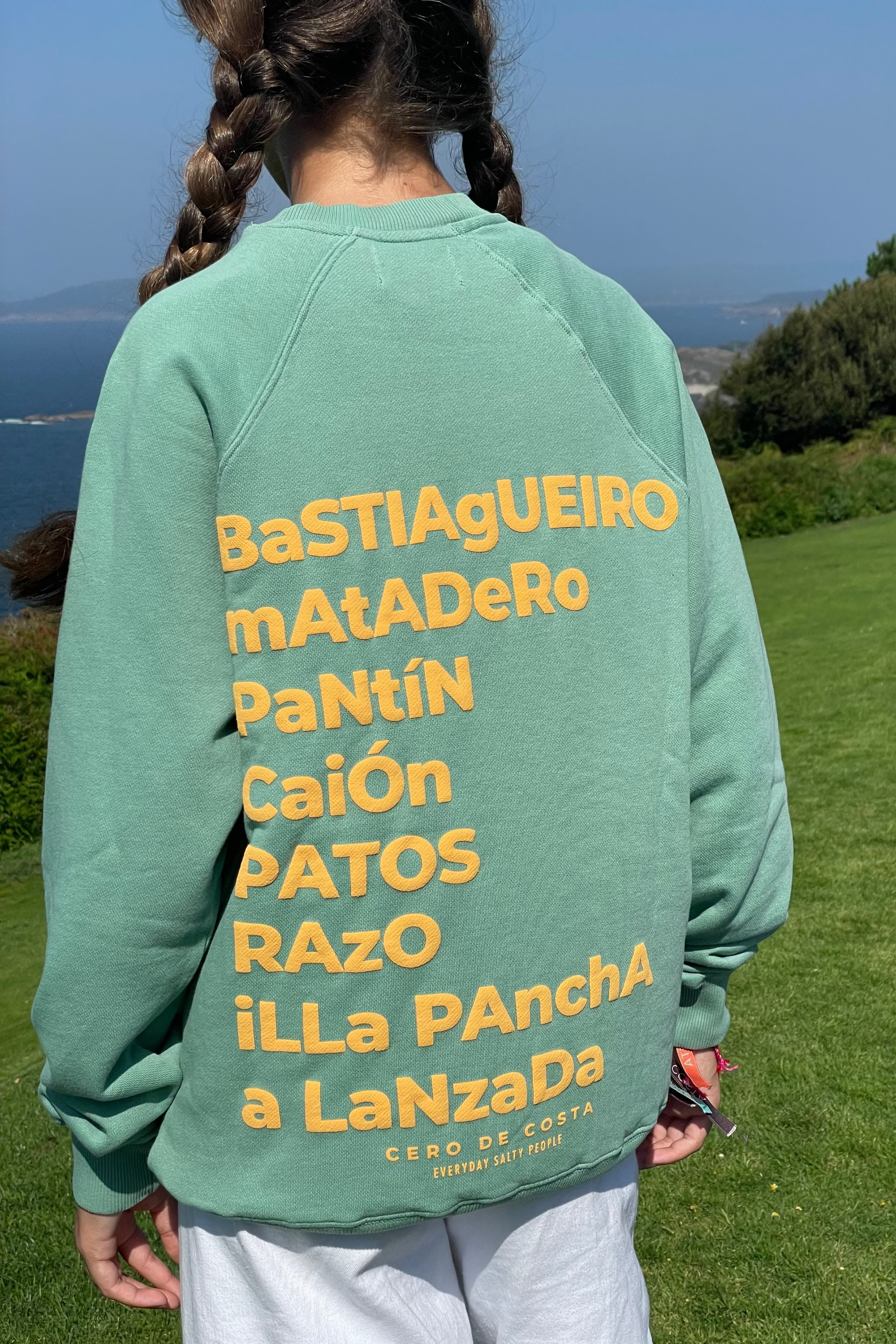 SUDADERA VERDE AGUA/NARANJA "CERO DE COSTA" PLAYAS SURF