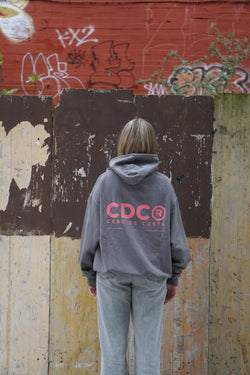 SUDADERA ANTRACITA/ROSA LOGO CDC CON CAPUCHA