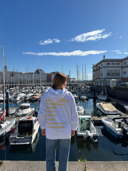 SUDADERA BLANCO/AMARILLO "CERO DE COSTA" PLAYAS SURF CON CAPUCHA